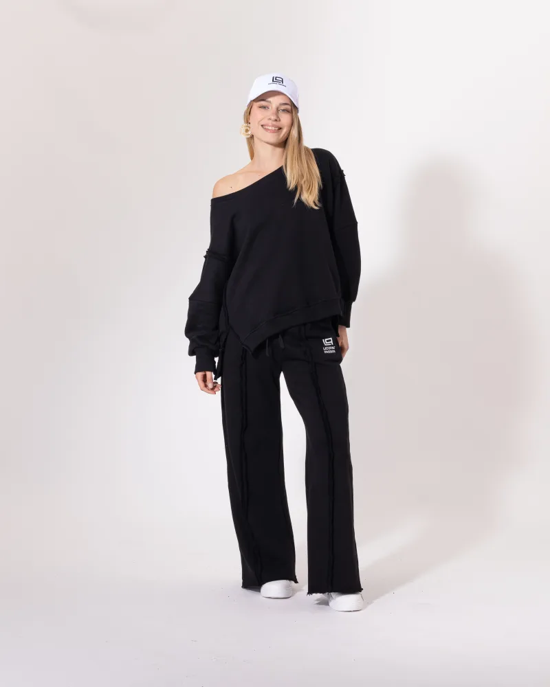 Ensemble jogging noir Licorne Passion en pied, sweat oversize épaule dénudée et pantalon ample